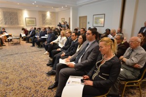 The audience attentively following one of the presentations about peace and security